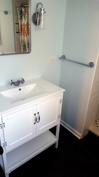 White cabinet with granite top