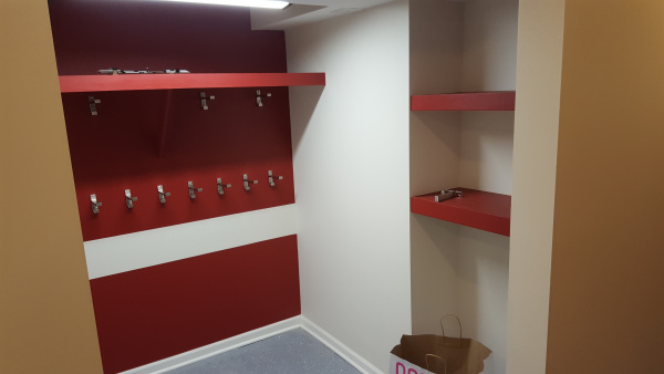 Open closet with shelves and hooks