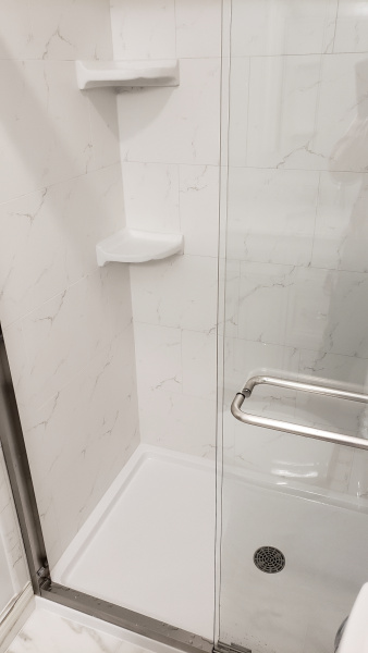New shower with corner shelves