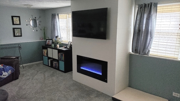 Electric fireplace with porcelain tiles around