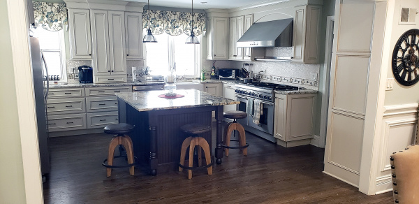  Kitchen after remodeling with island and granite countertop 
